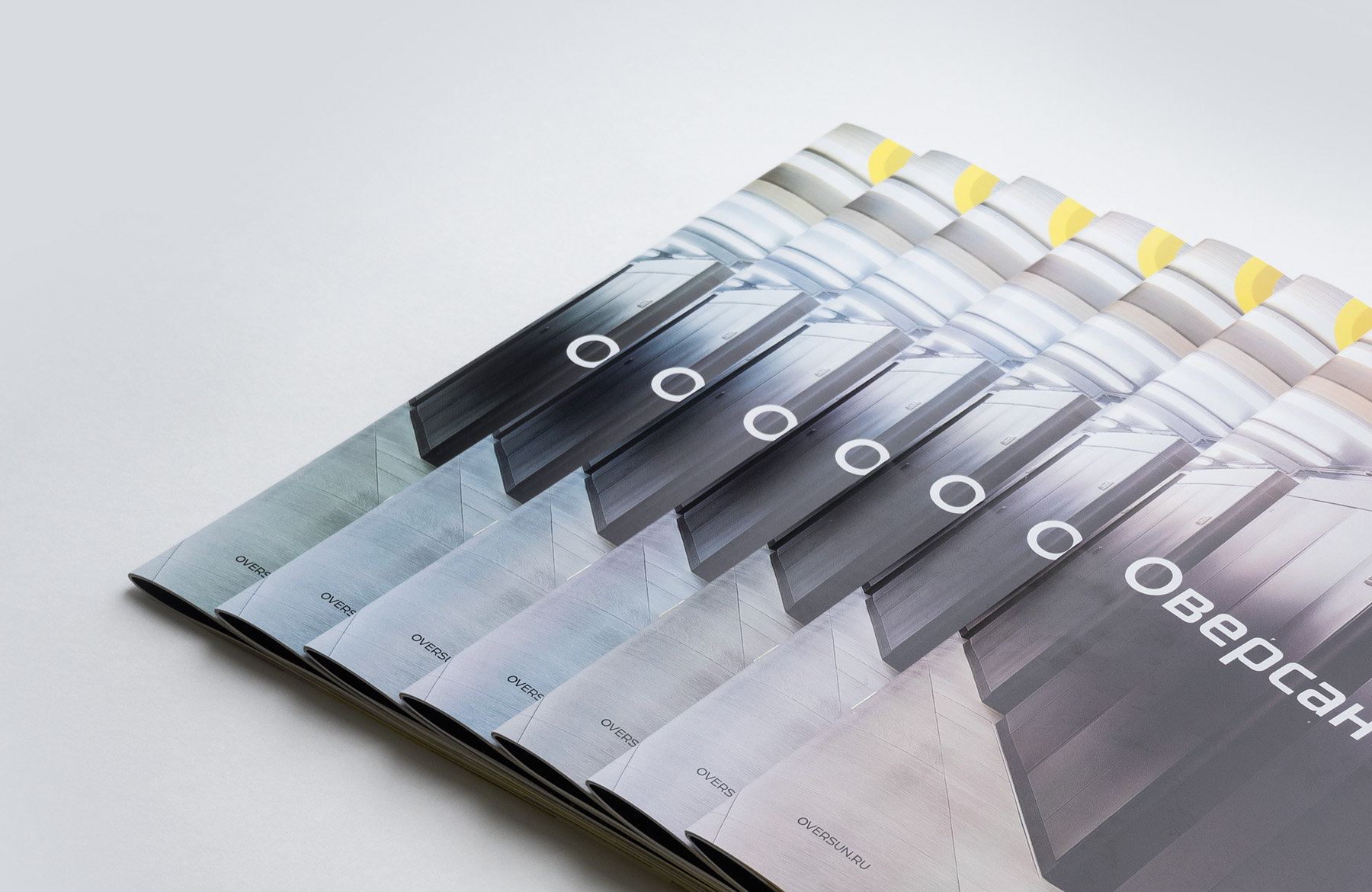 Несколько обложек брошюры Оверсан